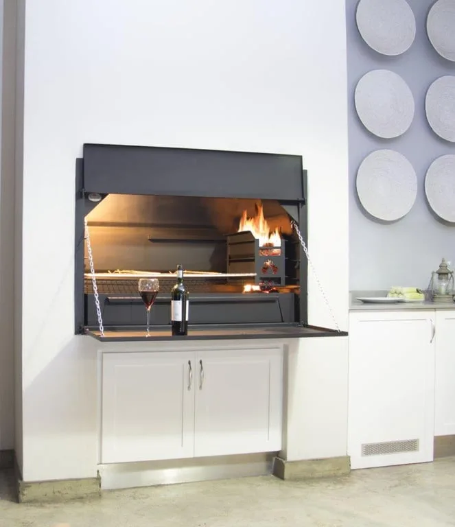 Home Fires built-in braai installed in a kitchen with doors open