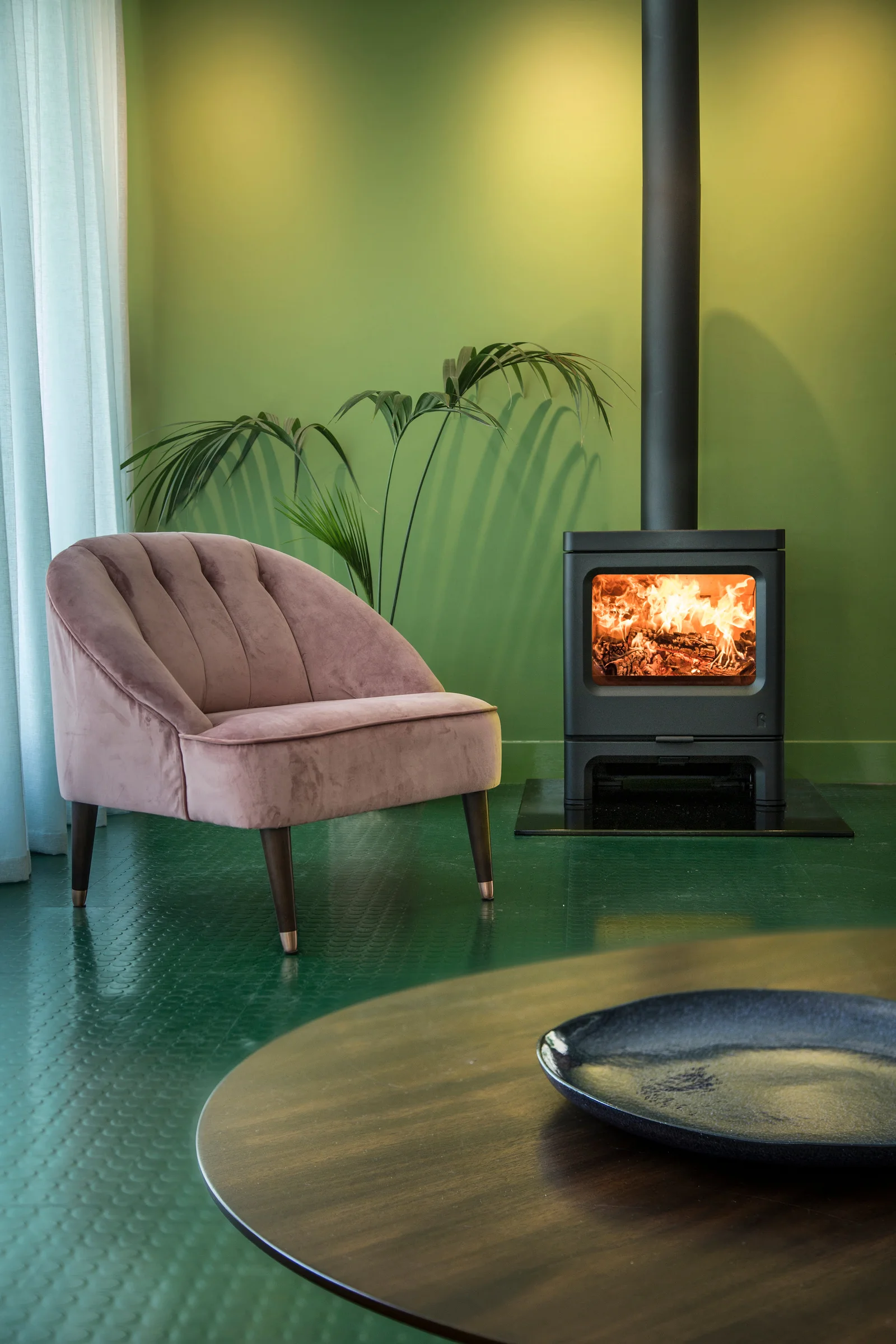 Charnwood Skye freestanding fireplace in a warm interior setting
