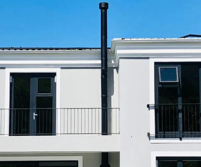 Black Dinak flues in an installation setting