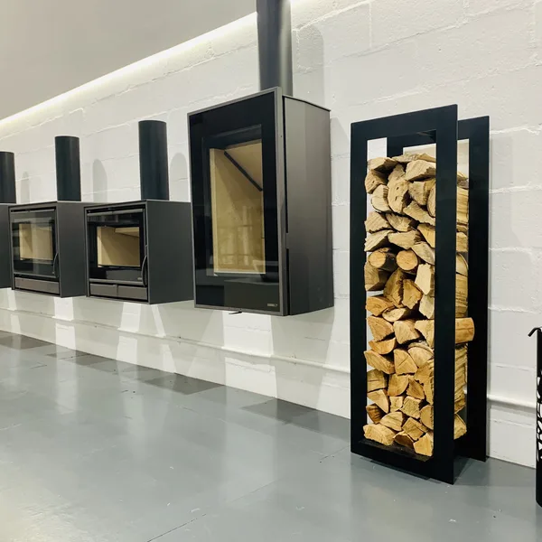 Fireplace log holder accessory displayed with firewood