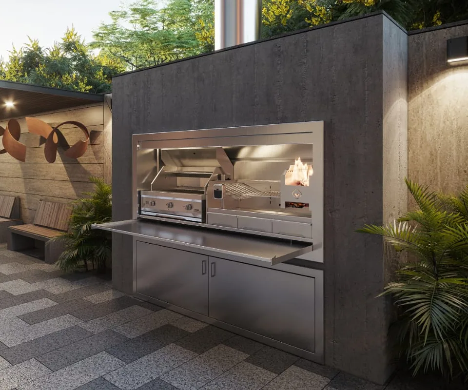 Outdoor built-in combo braai with a lit fire